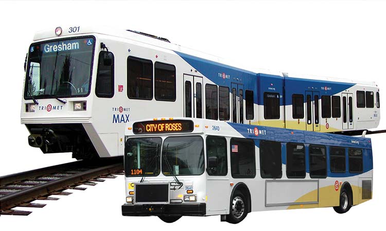 TriMet bus and MAX with new graphic look of mostly white vehicles with a blue arc coming down from the top