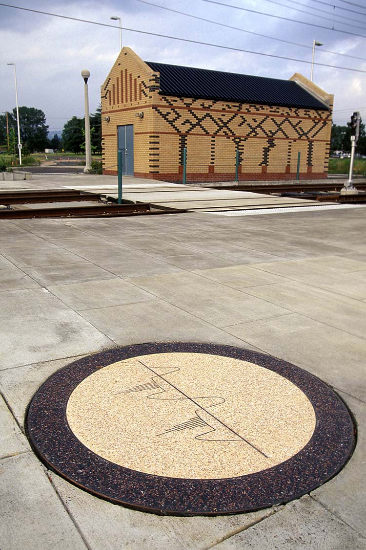 Systems building and mathematical symbol inlaid into the concrete