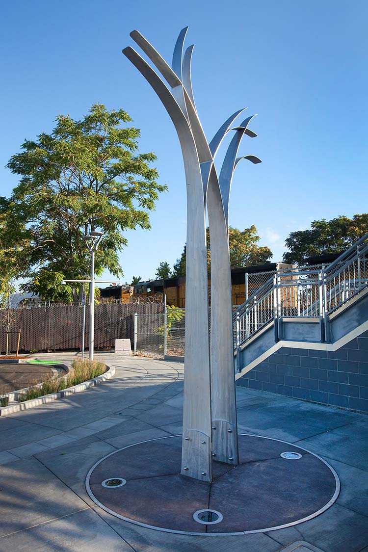 'Along These Lines' polished metal sclpture in the outlined shape of a tree