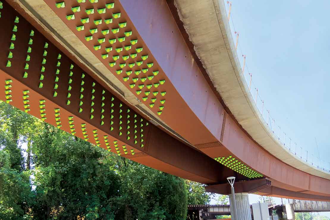 'Flow-Zone' - the underside of the light rail bridge is decorated with a pattern made of aluminum reflectors