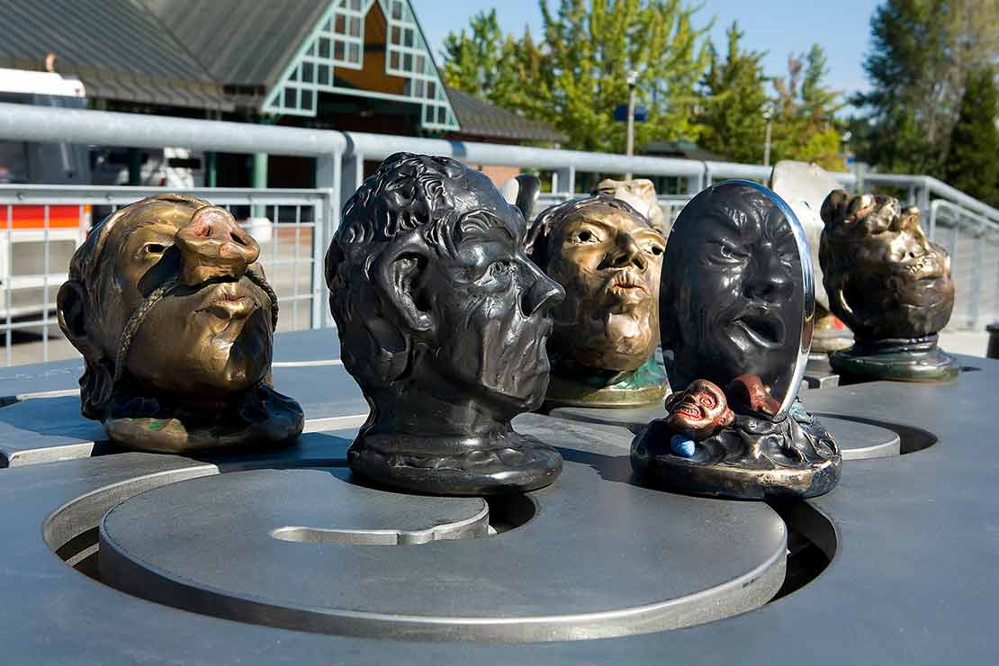 The Beaverton Interactivator detail - 5 heads with masks