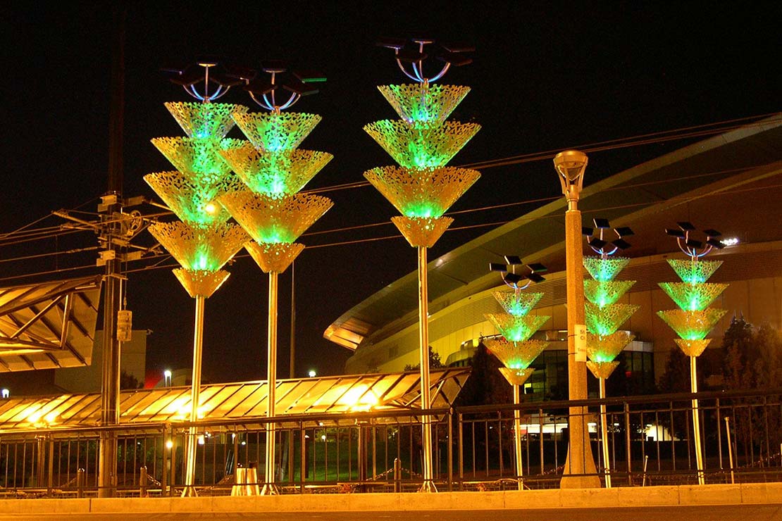 Silicon Forest sculpted abstract trees with green and yellow lighting