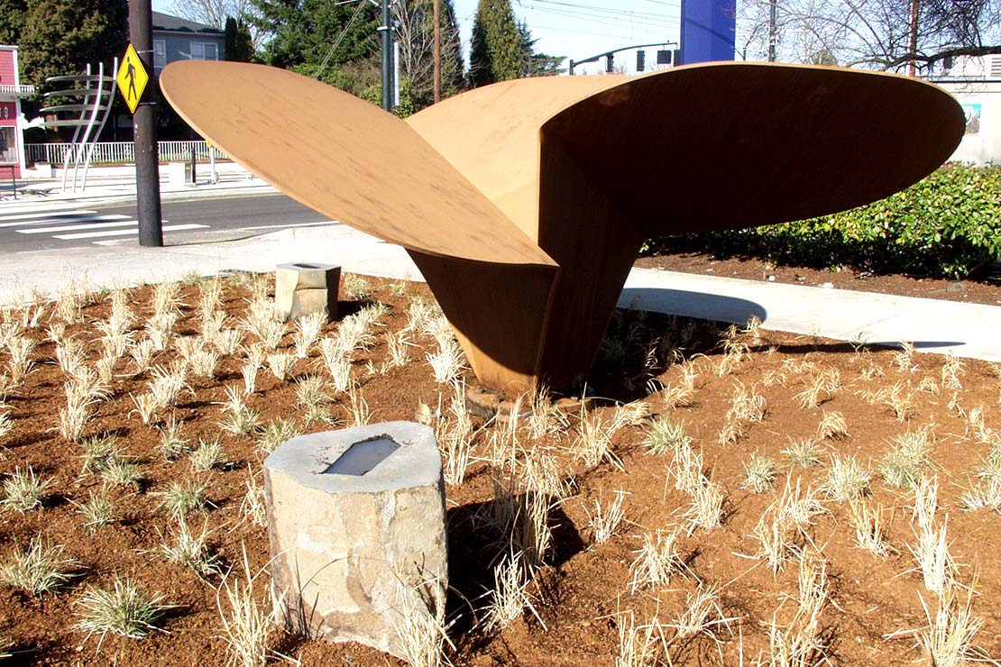 Propform - large wooden sculpture similar to a propeller on a boat