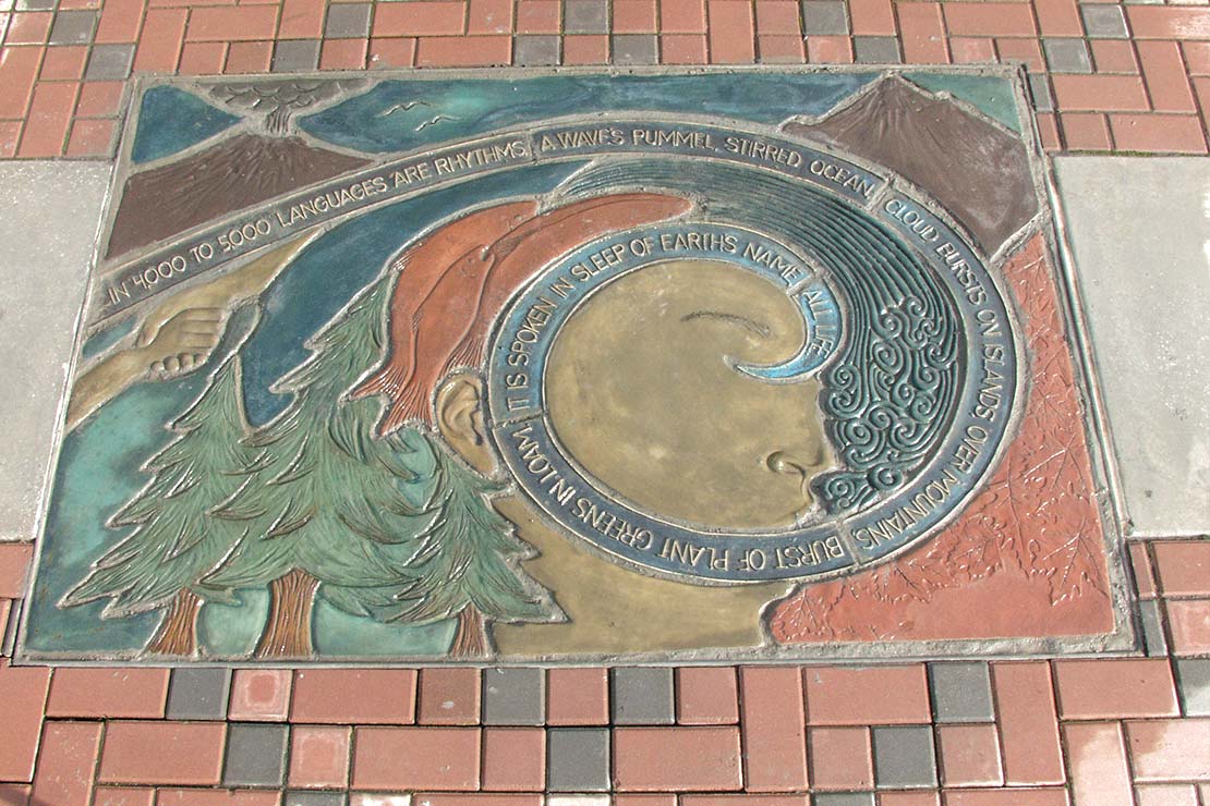 Community map - embedded concrete sculpture in red bricks